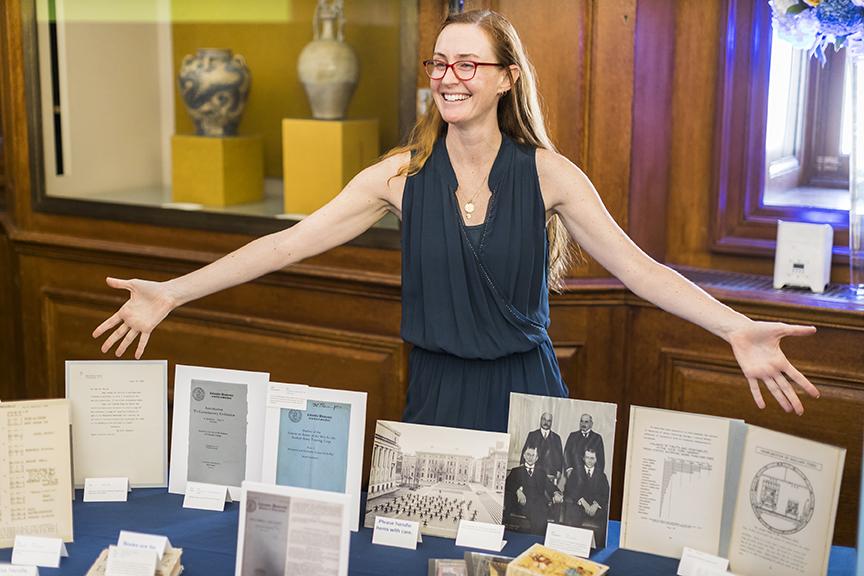 Student presenting her work as part of the exhibit