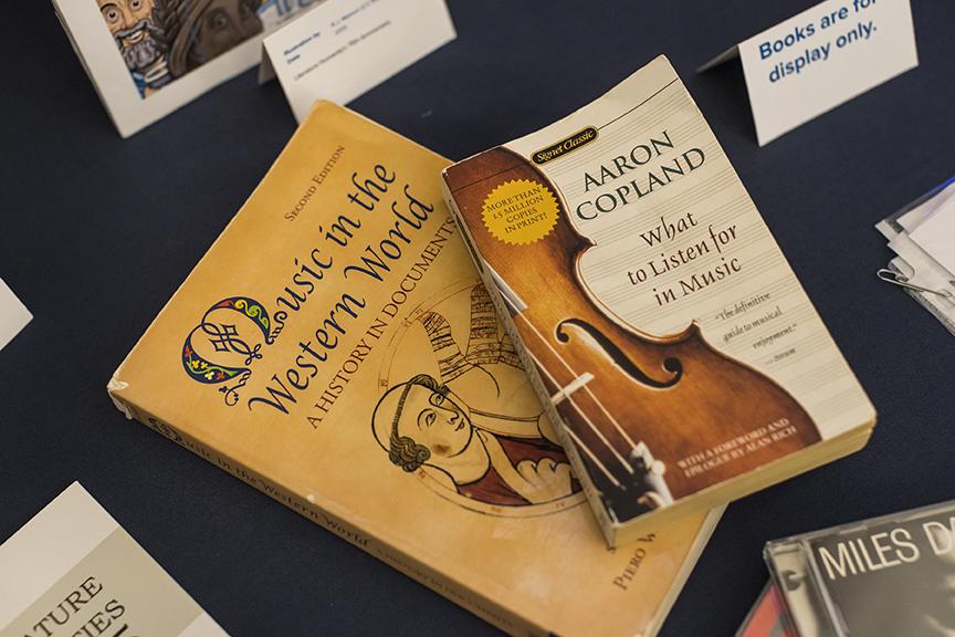 Core books laying on a table as part of the student exhibit.